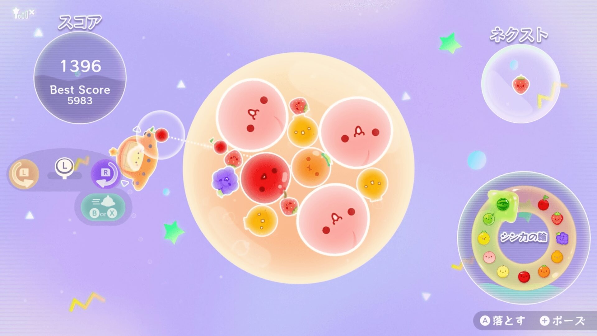 スイカゲーム ぷらねっとのゲーム画面、カジツの惑星とフルーツが描かれている様子